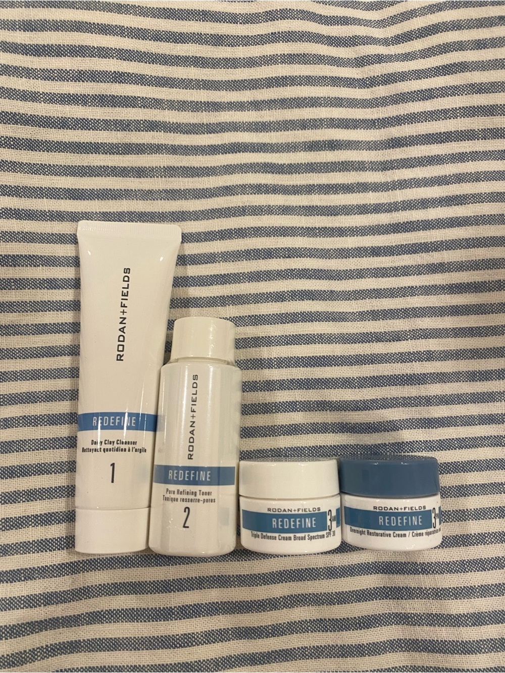 Rodan + Fields REDEFINE Skincare Set in White and Blue